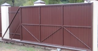 Купить откатные ворота из профнастила Новоуральск, цена от 1758 руб.