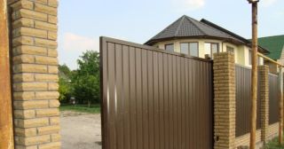 Купить откатные ворота из профнастила Новоуральск, цена от 1758 руб.
